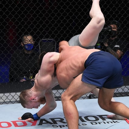 Dustin Stoltzfus slams Joe Pyfer in a middleweight fight during week two of ‘Dana White’s Contender Series’ season four at UFC Apex in Las Vegas. Photos: Chris Unger/DWCS LLC/Zuffa LLC