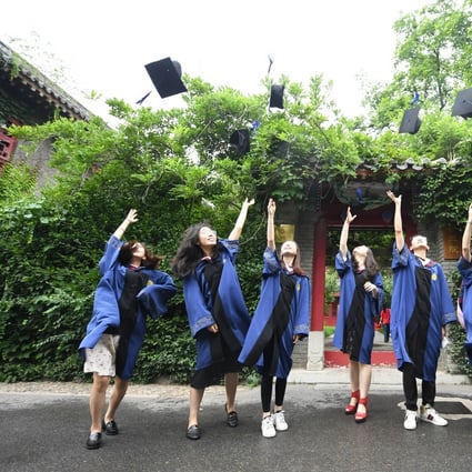 Graduates throw their hats in the air at Peking University in Beijing, capital of China, July 2, 2020. Photo: Xinhua