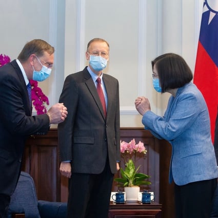President Tsai Ing-wen greets US officials accompanying Secretary of Health and Human Services Alex Azar (right) on a visit to the Presidential Office in Taipei on August 10. Photo: AFP
