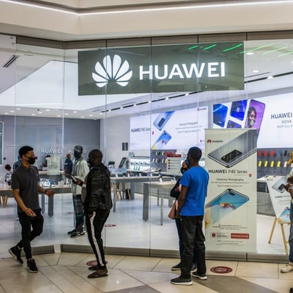 Customers wait outside a Huawei store in Pretoria, South Africa. Photo: Bloomberg