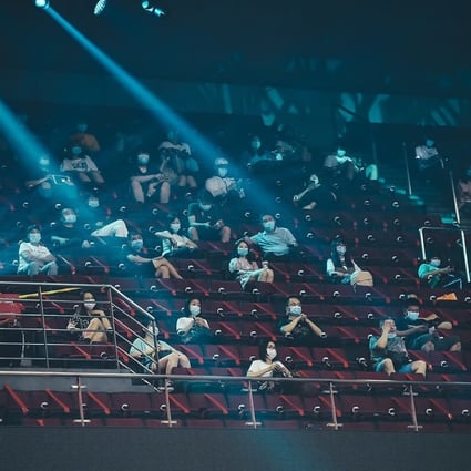 The Honour of Kings World Champion Cup 2020 has a sparse audience at Beijing's Wukesong Arena on August 16 thanks to strict controls because of the coronavirus. Photo: Tencent