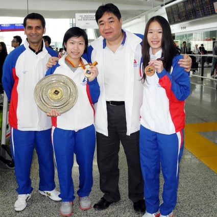 Tony Choi, then squash head coach, with Annie Au Wing-chi (second from left) and Joey Chan Ho-ling and fellow coach Faheem Khan after winning gold and bronze at the 2015 Asian Championships. Photo: Handout