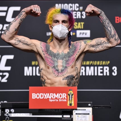 Sean O'Malley poses on the scale during the UFC 252 weigh-in. Photo: Jeff Bottari/Zuffa LLC
