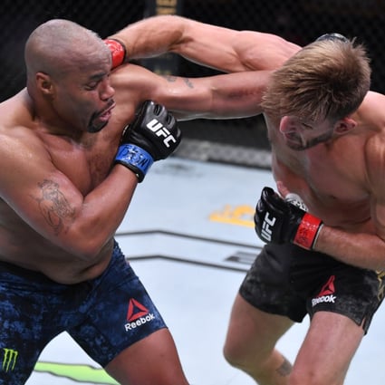 Daniel Cormier and Stipe Miocic trade blows in their UFC heavyweight championship bout at UFC 252. Photo: Jeff Bottari/Zuffa LLC