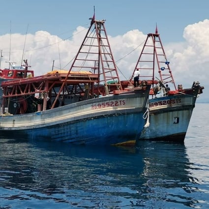 Vietnamese fishing boats are seen detained in Malaysian territorial waters in Kelantan on Monday. Photo: Malaysian Maritime Enforcement Agency / Handout via Reuters