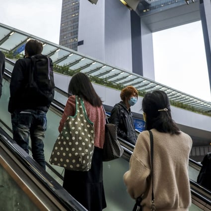 People head towards a footbridge leading to government offices in Tamar. Photo: Sam Tsang