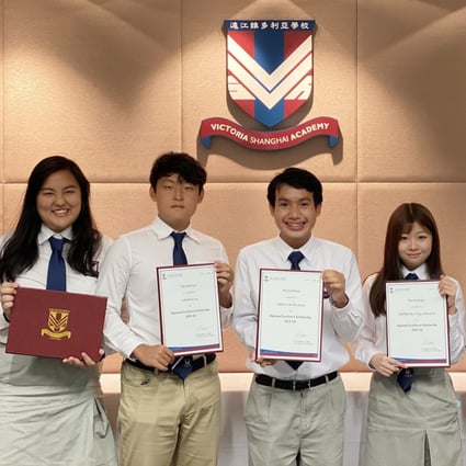 Victoria Shanghai Academy student Jason Chan (second left), who previously scored a 44 on the International Baccalaureate, saw his grade improve to a perfect 45 after adjustments. Photo: Chan Ho-him
