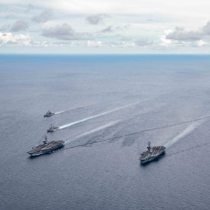 The American aircraft carriers USS Ronald Reagan and USS Nimitz with their carrier strike groups during a July 2020 drill in the South China Sea. Photo: EPA