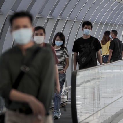 Passengers on a travelator at Changi Airport in Singapore. Photo: EPA