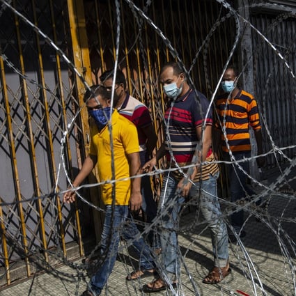 Migrant workers seen inside a locked down area in Kuala Lumpur on May 15, 2020. File photo: EPA-EFE