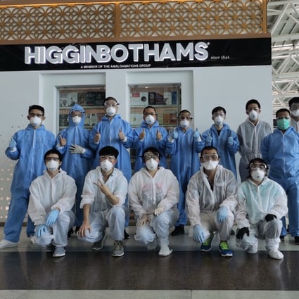 William Li and his colleagues pictured wearing full personal protective gear in Chennai International Airport at the beginning of their journey. Photo: William Li