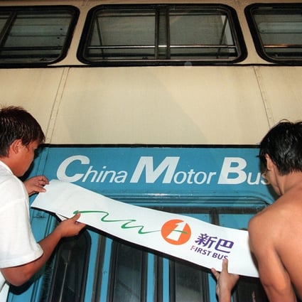 A New World logo replaces a China Motor Bus logo on the side of a bus in 1998. This month New World First Bus, as CMB became, was sold again, along with Citybus, to private equity buyers. Photo: SCMP
