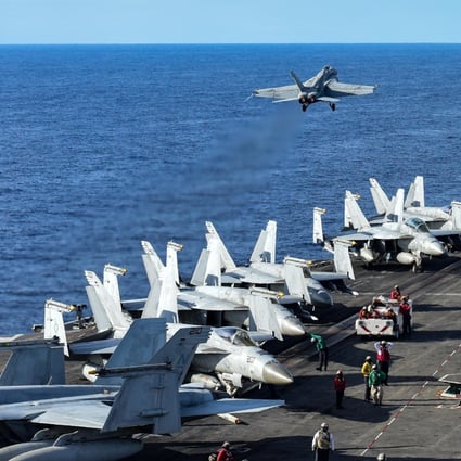 An F/A-18E Super Hornet takes off from the flight deck of a US navy aircraft carrier in the South China Sea. Photo: EPA