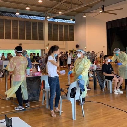 Long queues are seen at a regional screening centre in Singapore where would-be travellers can undergo coronavirus testing. Photo: Handout