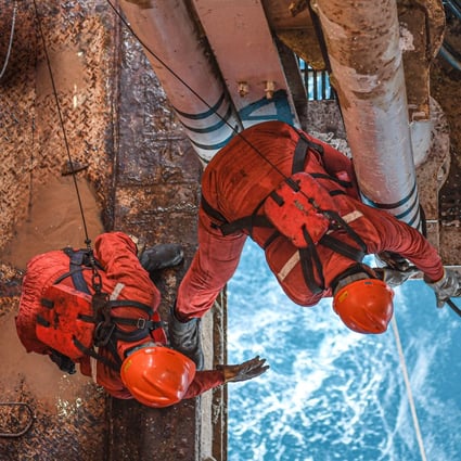 Workers balance on a Chinese offshore oil platform in the South China Sea on July 27. The South China Sea is one of China’s red lines. Photo: Xinhua