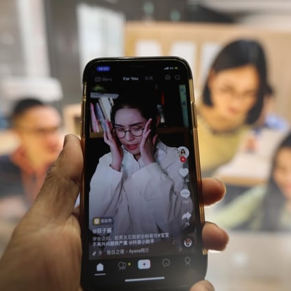 A smartphone shows live streaming on the Douyin short video platform. Photo: SCMP/Simon Song