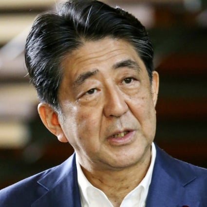 Japanese Prime Minister Shinzo Abe speaks to reporters at his official residence in Tokyo on Monday. Photo: Kyodo News via AP