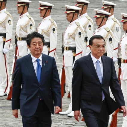 Japanese Prime Minister Shinzo Abe and Chinese Premier Li Keqiang in Tokyo in 2018. Photo: EPA-EFE