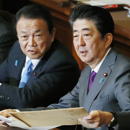 From left: Foreign minister Toshimitsu Motegi, Finance minister Taro Aso and Japan’s former PM Shinzo Abe. Photo: Kyodo
