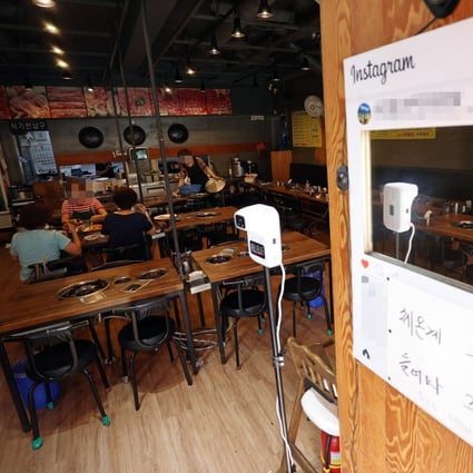 For the next week, franchise cafes will only be allowed to offer takeaway to patrons. Photo: EPA
