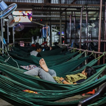 Inside a hammock cafe on the outskirts of Vietnam’s Ho Chi Minh City, where low-wage labourers can find some shelter for 86 US cents per night. Photo: Giang Pham