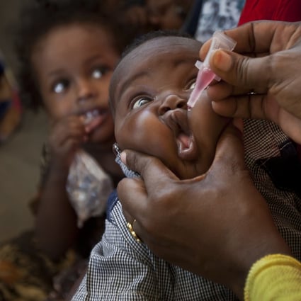 A Somali child receives a polio vaccine in this 2013 file photo. Photo: AP