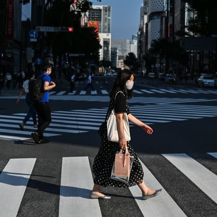 The coronavirus pandemic has reduced working hours in Japan by 10 to 20 per cent, according to the study. Photo: AFP