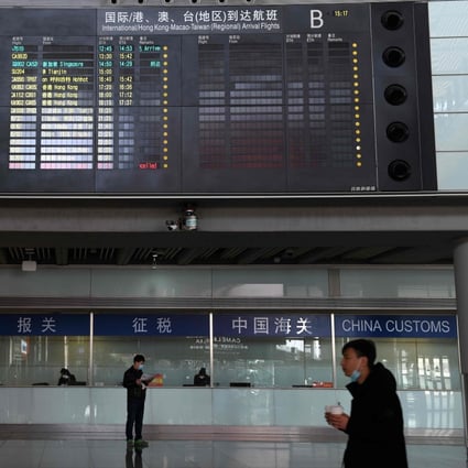 Foreign staff trying to get back to China have to wait for their visa applications to be processed and try to get on one of the limited number of international flights. Photo: AFP