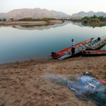 A fisherman on the Mekong. Photo: Reuters