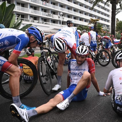 Thibaut Pinot of Team Groupama-FDJ sits on the ground after a crash during the first stage of the 107th edition of the Tour de France. Photo: AFP