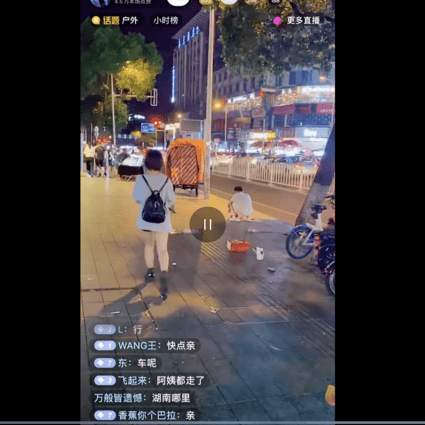 A live-streamer films himself following young women on the street before being banned from the Douyin platform. Picture: Douyin via Weibo