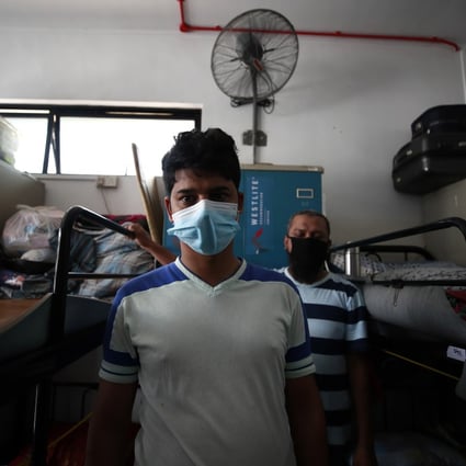 Migrant workers pictured in their dormitory room in Singapore on August 18. Photo: EPA