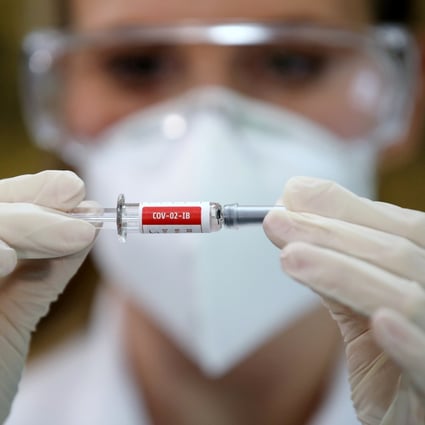 A nurse holds a syringe containing China’s Sinovac vaccine at a hospital in Porto Alegre, Brazil in August. Photo: Reuters