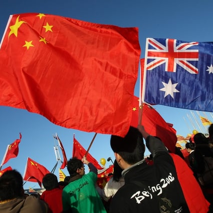 Thousands of Chinese supporters rally outside Parliament House during the Beijing 2008 Olympic torch relay through Canberra in 2008. Photo: AFP
