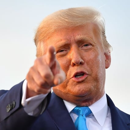 US President Donald Trump told journalist Bob Woodward that he was eager to play down the coronavirus outbreak so as not to alarm Americans. Photo: AFP