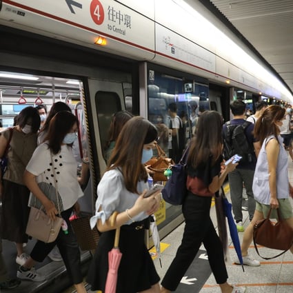 Commuters alight at Admiralty MTR station on August 19. Tracking human mobility and combining that data with epidemiological evidence can help cities pinpoint areas at risk of super-spreading events without having to shut down the entire city and its economy. Photo: Nora Tam
