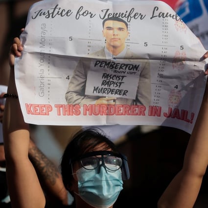Members of an LGBT group gather for a protest on Tuesday after Philippine President Rodrigo Duterte pardoned US soldier Lance Corporal Joseph Scott Pemberton, who was convicted of killing Filipino transgender woman. Photo: Reuters