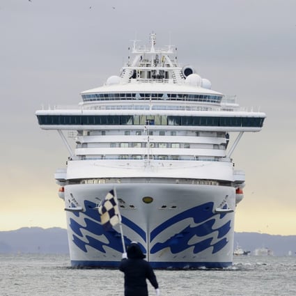 The cruise ship Diamond Princess approaches the port of Yokohama in February. Photo: Kyodo