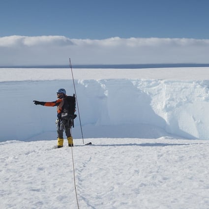 A field guide at the Brunt ice shelf in Antarctica in January 2020. Photo: Robert Taylor/British Antarctic Survey via AP
