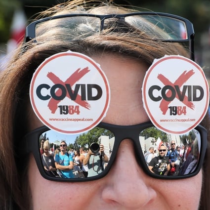 Hundreds of people protested in the Polish capital Warsaw on Saturday against measures imposed to prevent the spread of the coronavirus. Photo: EPA