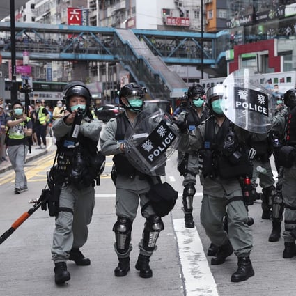 Riot police are deployed near the Sogo department store in Causeway Bay during an anti-national security law protest. Photo: Sam Tsang