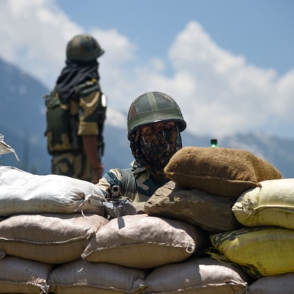 An Indian Border Security Force member guards a national highway leading to the Ladakh region in June. India said Chinese troops carried out military manoeuvres in a bid to “change the status quo” on the disputed Himalayan border, but they were blocked by Indian soldiers. Photo: DPA