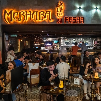Hong Kong’s bars and pubs can reopen from Friday, with the government expected to further lift social-distancing measures. Photo: Bloomberg