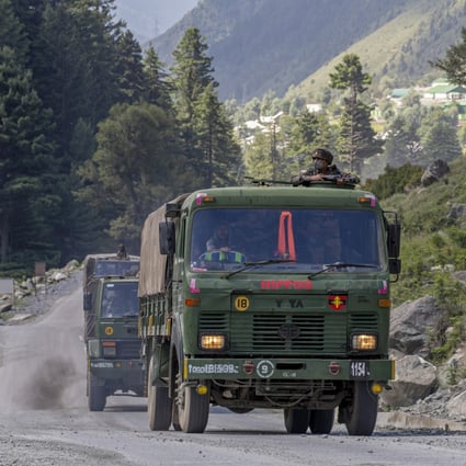 An Indian army convoy travels along the Srinagar-Ladakh highway at Gagangeer in Kashmir. China and India remain locked in a stand-off on their disputed border. Photo: AP