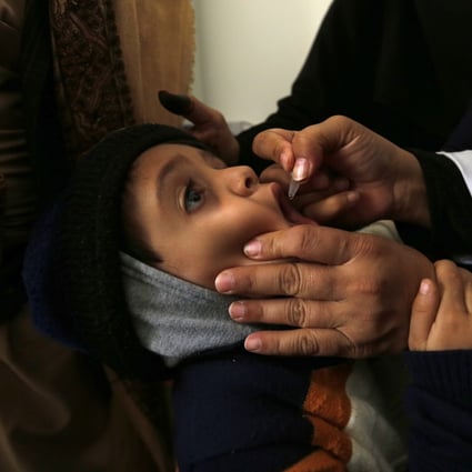 A Unicef health worker administers a vaccination to a child during an anti-polio campaign at a health centre in Sanaa, Yemen, on November 27, 2018. The UN and its agencies continue to do indispensable work around the world despite its members and donors consistently overpromising and underfunding its operations. Photo: EPA