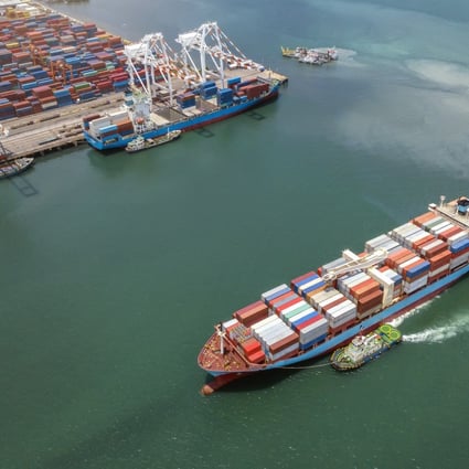 A container ship carries cargo to a port in Thailand. Photo: Getty Images
