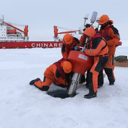 A Chinese research team from the Xuelong icebreaker sets up an ocean-profiling float in the Arctic Ocean in 2016. Photo: Xinhua