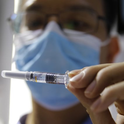 Four of the nine experimental vaccines undergoing phase 3 trials worldwide have been developed by Chinese companies. Photo: EPA-EFE