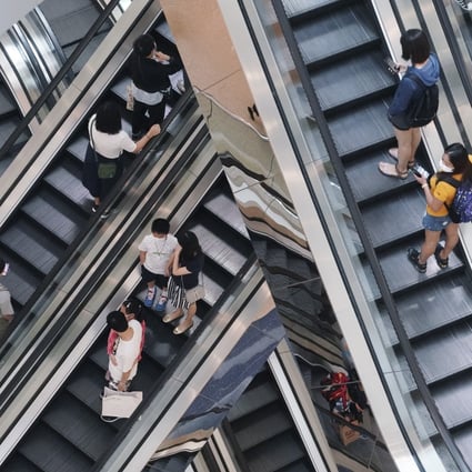 Shoppers return to a mall in Kowloon Tong, Hong Kong, on September 13 as the social-distancing rules against the coronavirus are relaxed. Economies must move away from models that focus on moving up the GDP growth ladder. Photo: Felix Wong