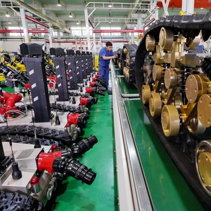 Beijing says it will boost investment in high-end manufacturing, including industrial robotics (above), under its new “strategic emerging industries” plan. Photo: Xinhua